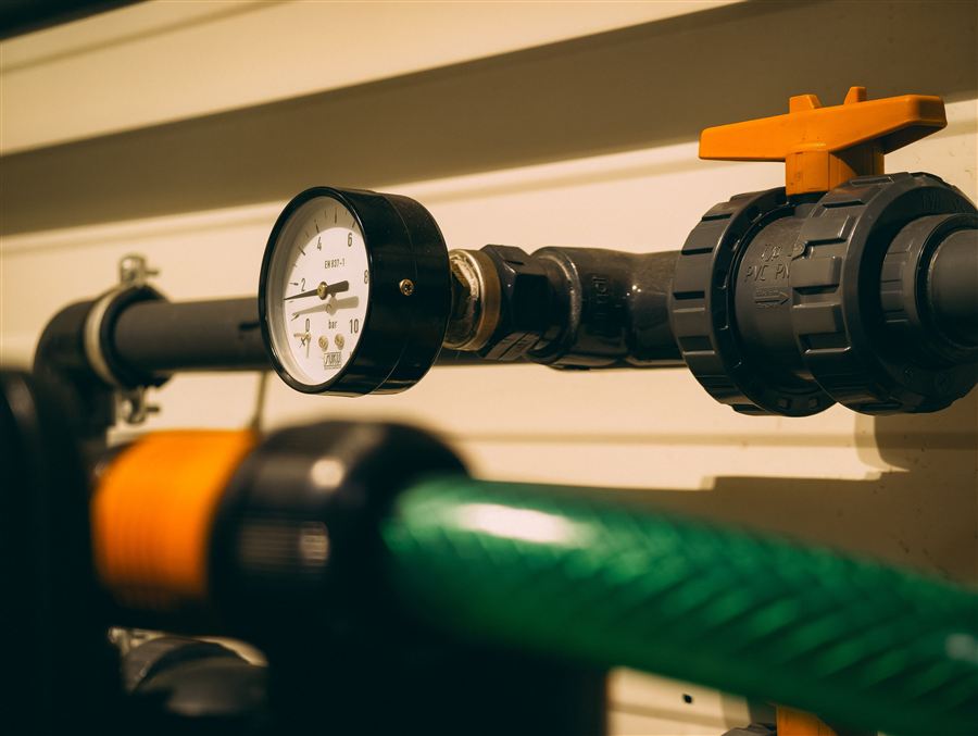 Pressure gauge and valve on water-circulation pipework
